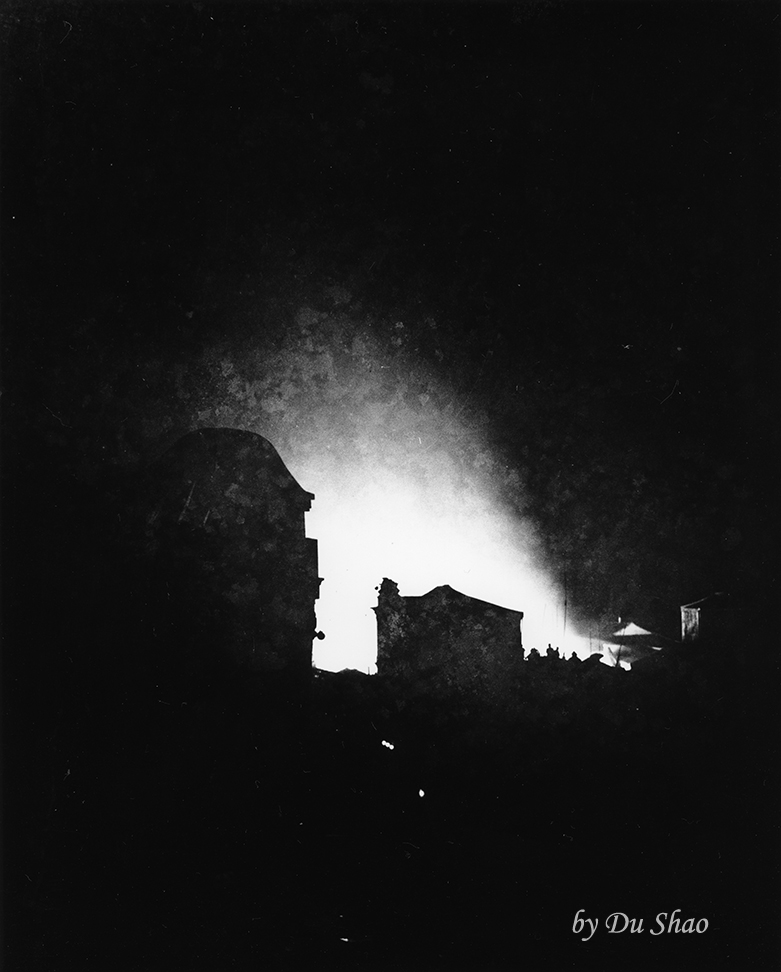 Leaping Flames Caused by Japanese Bombing During the Night